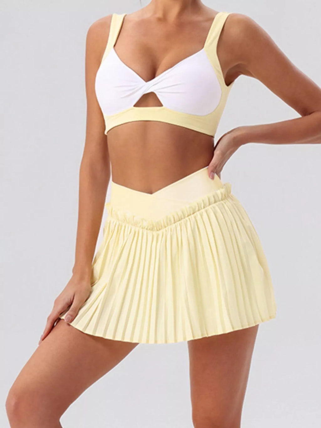Sleeveless V-Neck Crop Top and Pleated Skirt Active Set