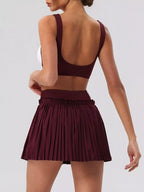 Sleeveless V-Neck Crop Top and Pleated Skirt Active Set