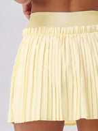Sleeveless V-Neck Crop Top and Pleated Skirt Active Set