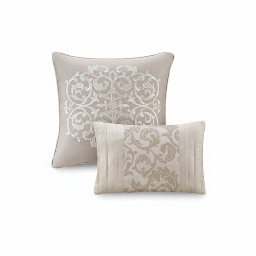 Two decorative pillows with intricate patterns on a white background