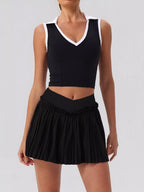 Sleeveless V-Neck Crop Top and Pleated Skirt Active Set