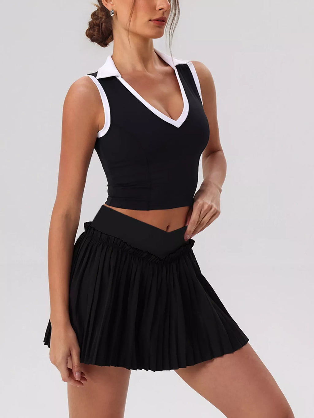 Sleeveless V-Neck Crop Top and Pleated Skirt Active Set