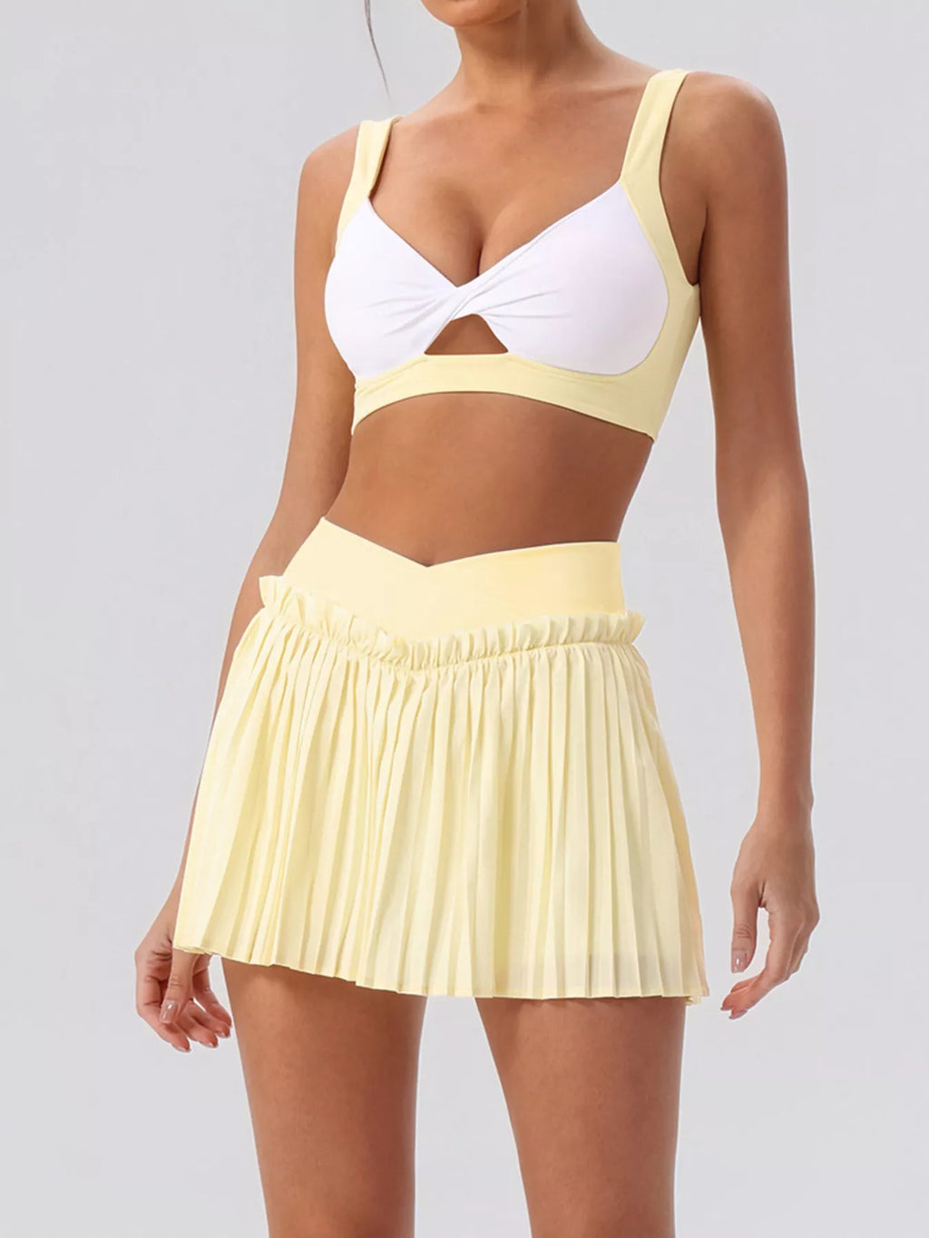 Sleeveless V-Neck Crop Top and Pleated Skirt Active Set
