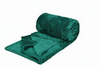 Green towel with 400 GSM label on a white background