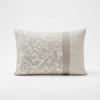 Decorative pillow with floral pattern on a beige background