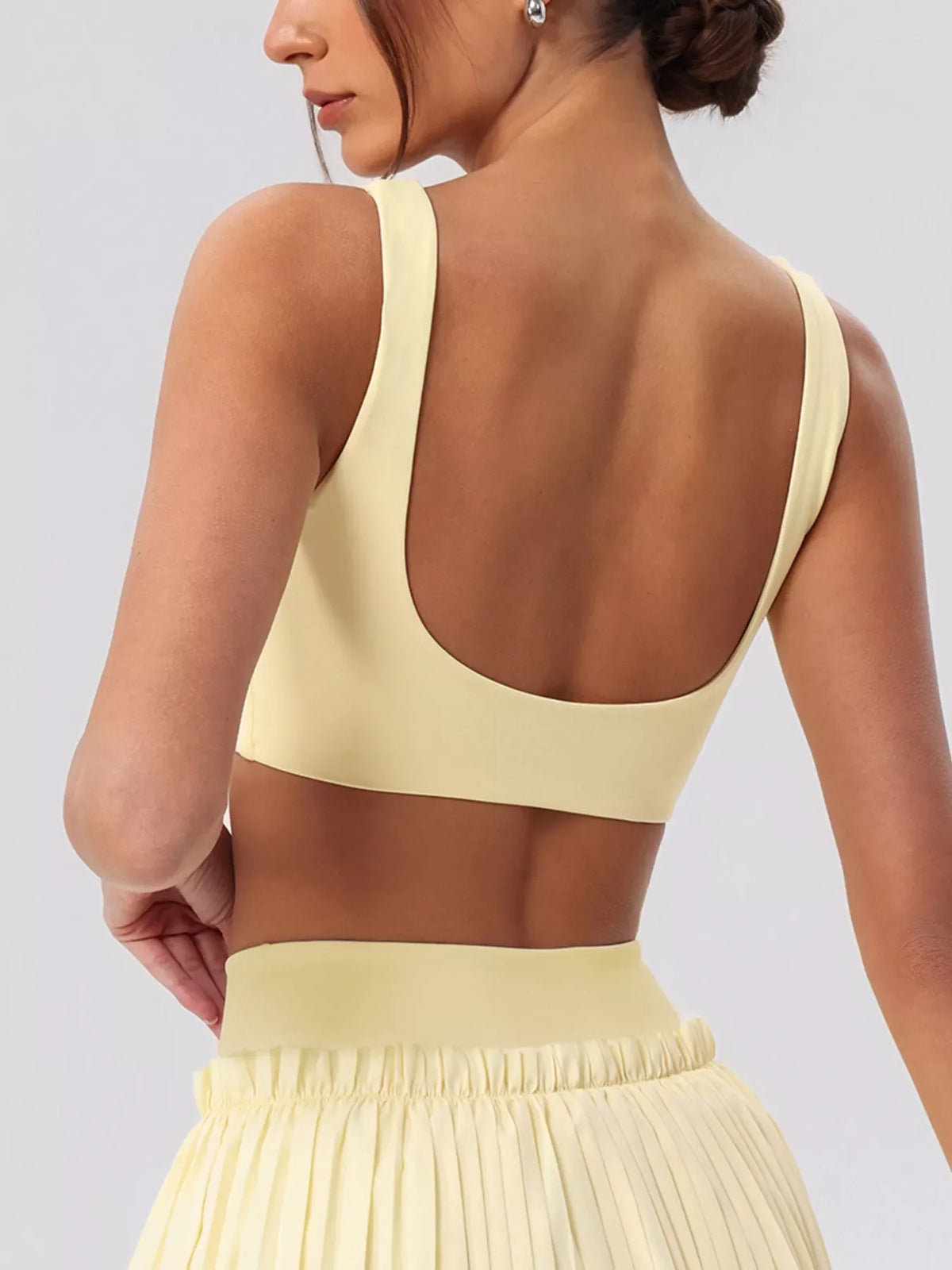 Sleeveless V-Neck Crop Top and Pleated Skirt Active Set