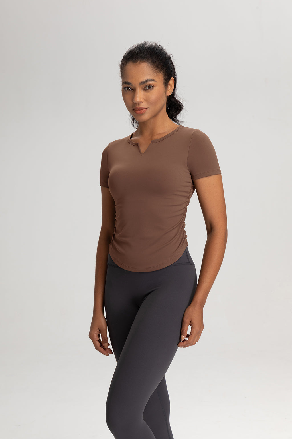 The Slim Fit V-Neck Athleisure Ruched T-Shirt with Built-In Pads