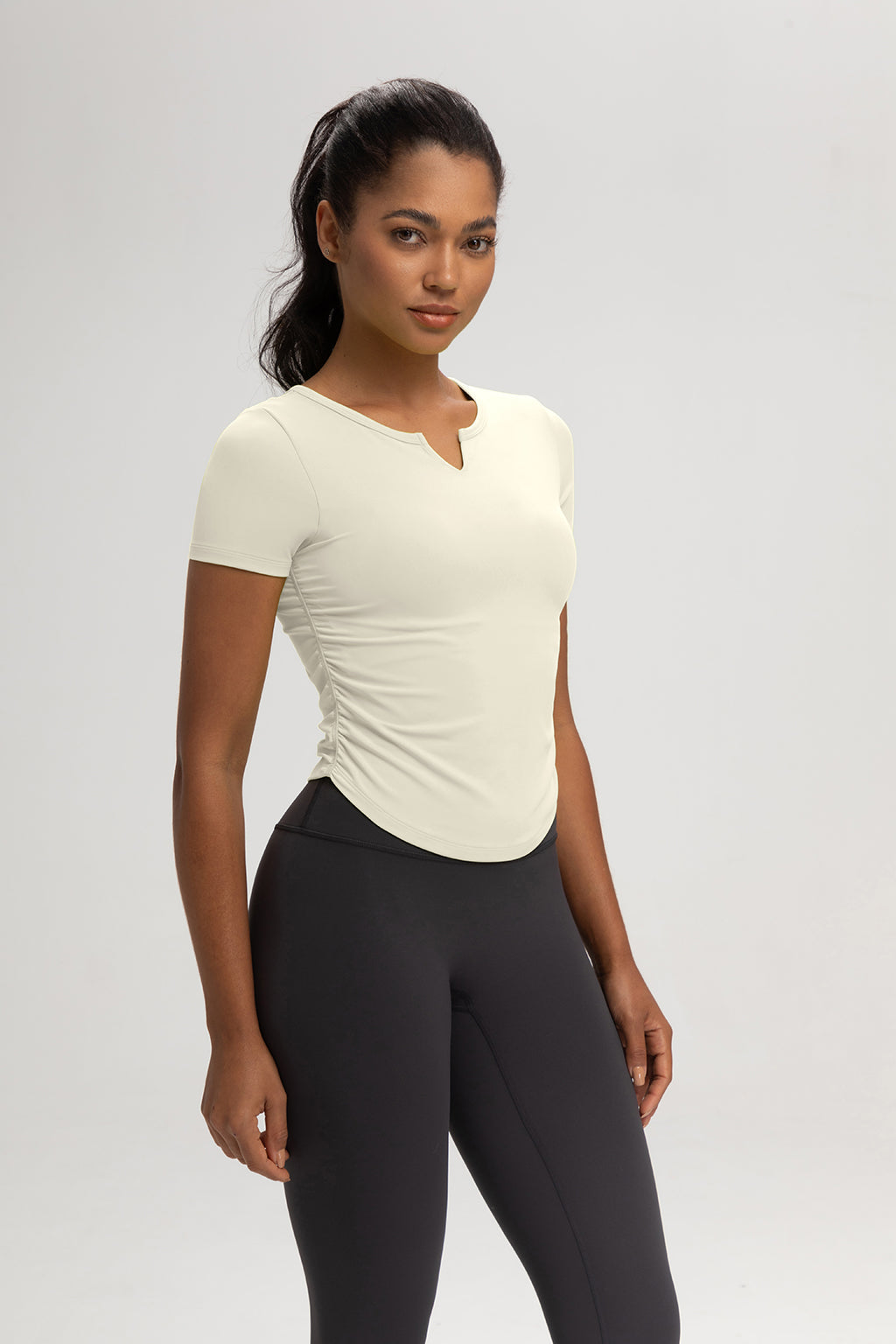 The Slim Fit V-Neck Athleisure Ruched T-Shirt with Built-In Pads
